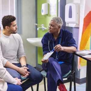 doctor explaining procedure to patient's parents